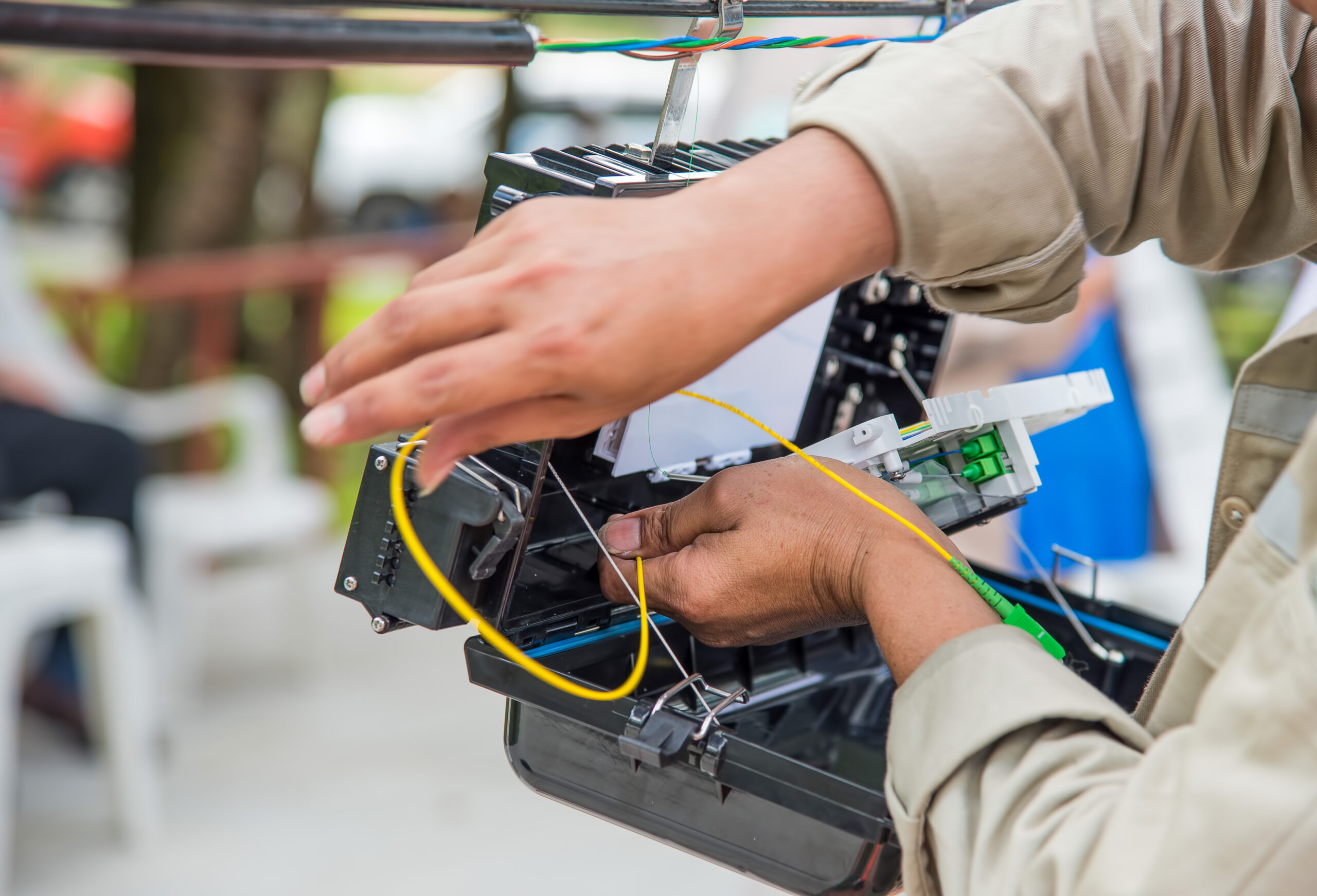 technicians are install cabinet on fiber optic cab 2024 12 06 08 19 51 utc scaled